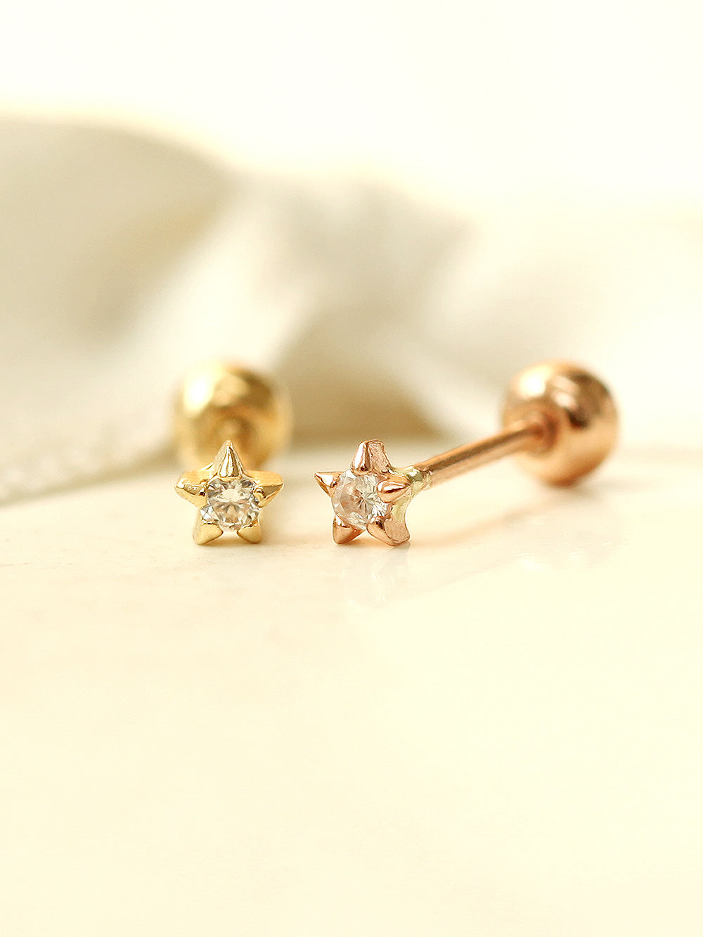 14K gold Mini Cubic Star cartilage earring 20g